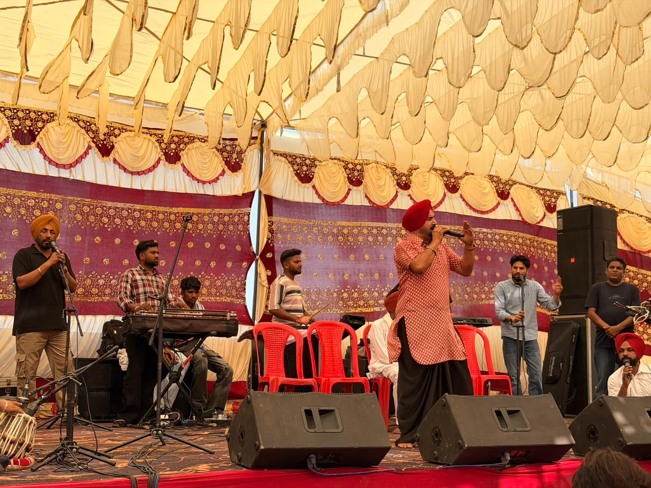 Prabh Sheron during a Punjabi live stage performance