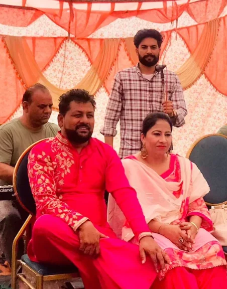 Prabh Sheron on stage with Shammi Khan during a live event